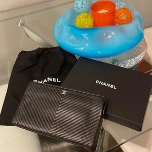 Chanel Black Fine Leather Chevron Clutch Bag Silver Metal Logo